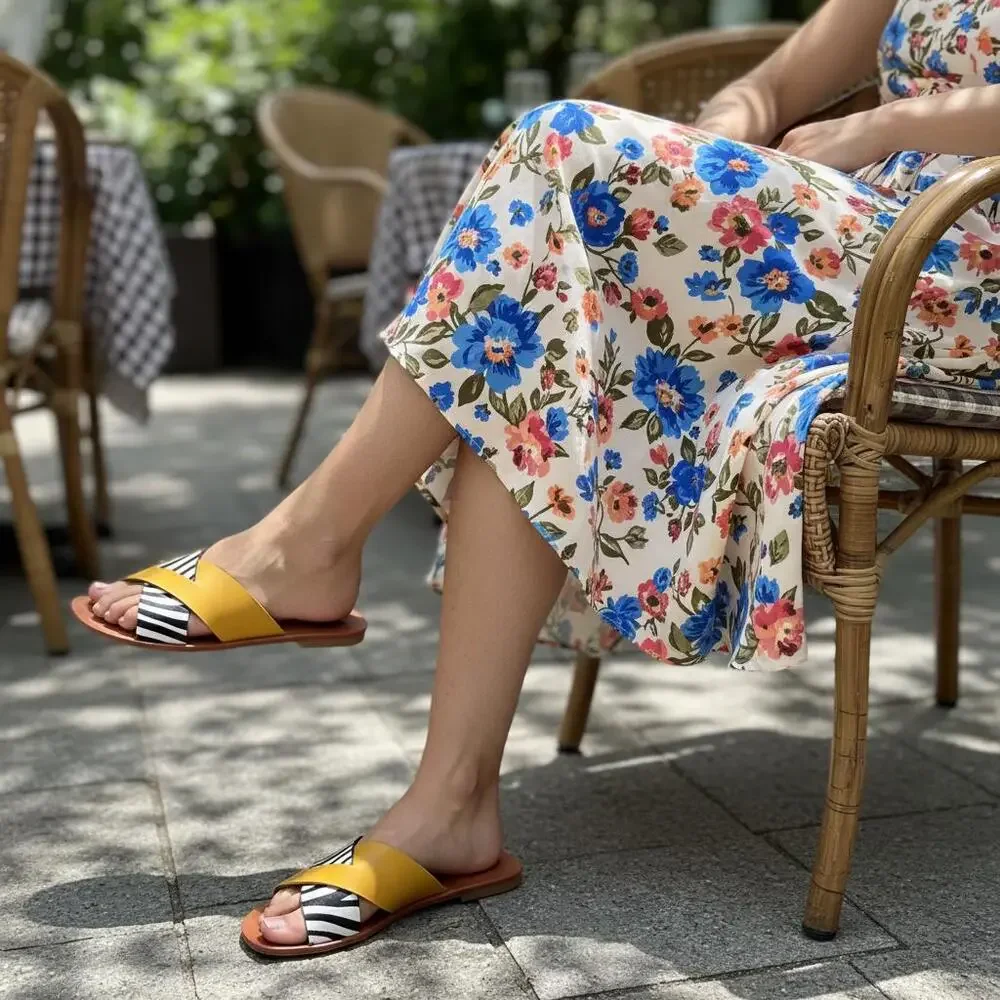 Zebra Print Cross-Strap Flat Slide Sandals in Mustard Yellow